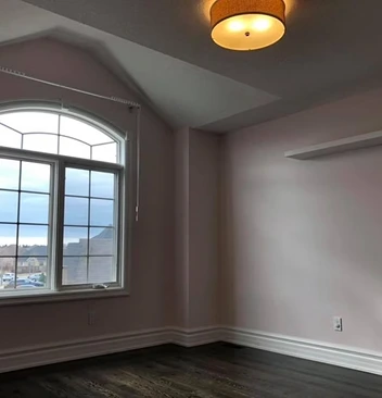Kitchen area painted in neutral tones